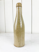antique glazed stoneware beer bottle
