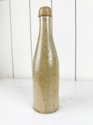 antique glazed stoneware beer bottle